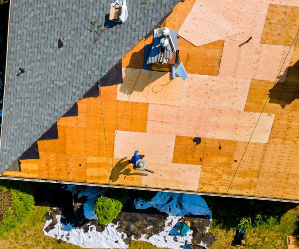 Roof repair by replacing old asphalt bitumen shingles